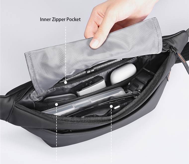 Interior organization pockets and quick-release key ring inside the Mark Ryden MR615 chest bag.