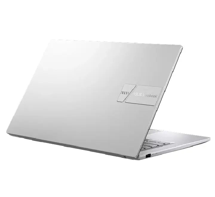 Close-up of the ASUS ErgoSense keyboard and large touchpad on the Vivobook 14 X1404VA for comfortable typing.