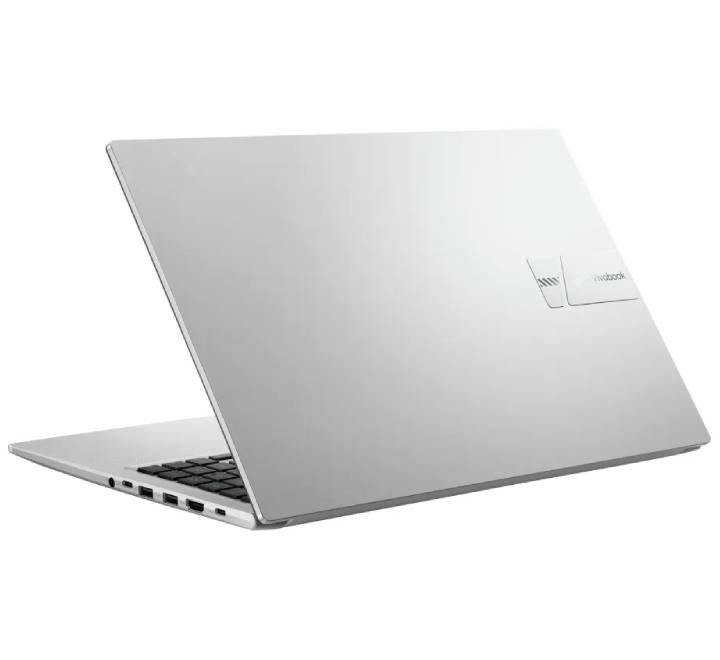 ASUS Vivobook 15 laptop set up on a modern office desk workspace