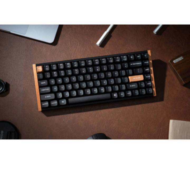 Close-up of the Hall Effect magnetic switches and keycaps on the Keychron K2HE black wood edition.