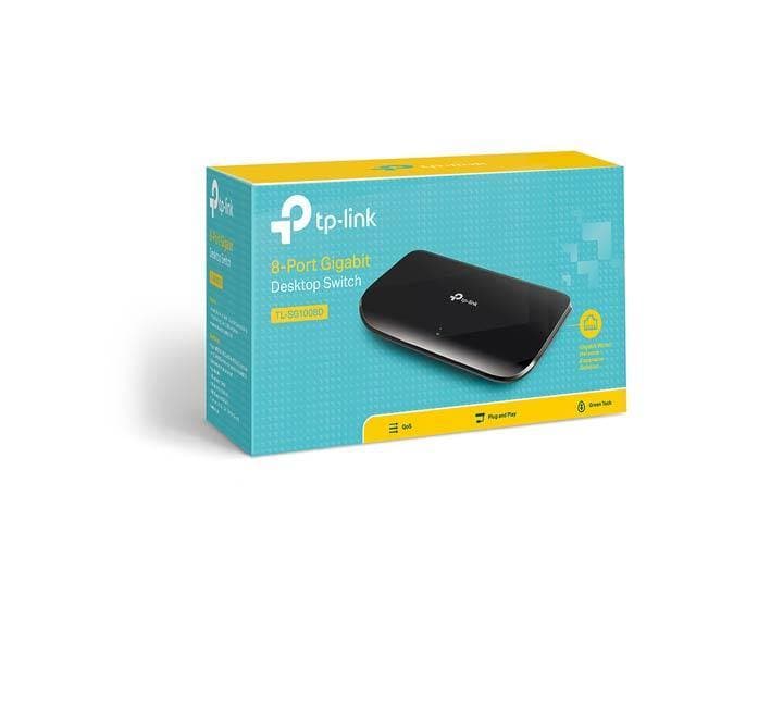 TP-Link TL-SG1008D compact gigabit switch installed on an office desk setup