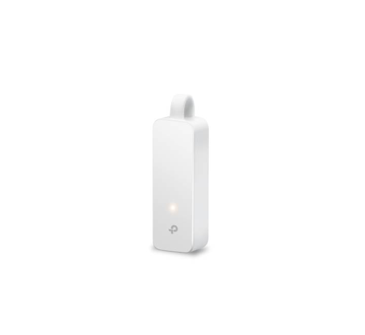 The TP-Link UE300C adapter connected to a modern slim ultrabook, providing a reliable wired RJ45 internet connection via a USB-C link.