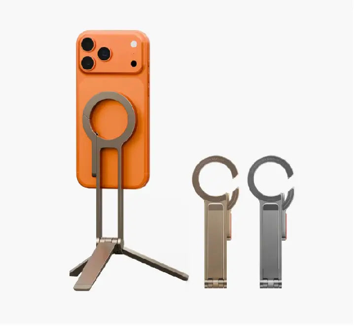 UNIQ Arcus magnetic tripod stand in TriArc stability mode holding an iPhone on a flat surface.