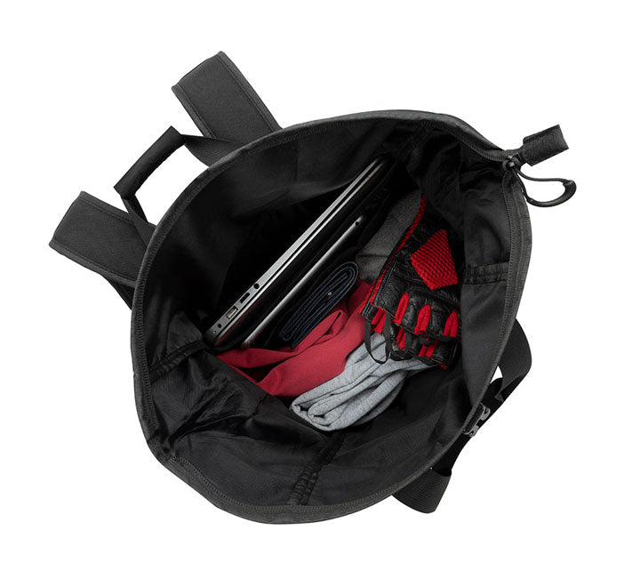 Side view of the black Rivacase Dijon 5321 backpack highlighting the quick access lateral zipper leading directly to the padded 15.6 inch laptop sleeve.