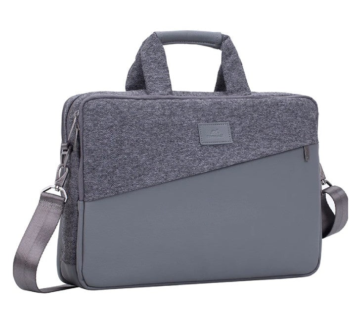 Inside padded compartment of Rivacase 7930 bag showing storage layout for 16-inch MacBook, 10.1-inch tablet, and front zippered organizer section.