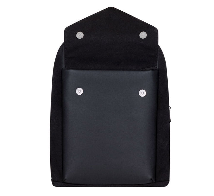 Open main compartment of Rivacase 8524 black canvas pack highlighting the high-contrast beige interior lining and separate 14 inch laptop and 10.5 inch tablet pockets.
