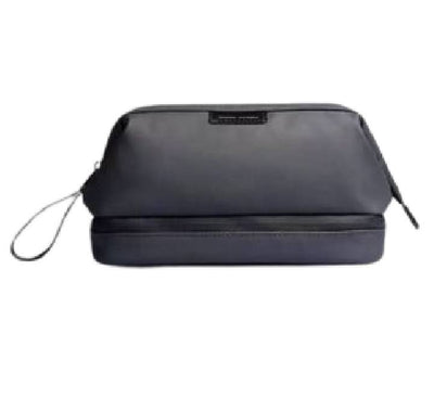 Graphite grey Mark Ryden MR264 SwitchStorage V travel toiletry bag showing its sleek minimalist shape on a clean bathroom counter in Myanmar.