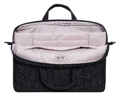 Close-up of the hidden anti-theft back pocket on the Rivacase 7931 laptop bag for secure storage.