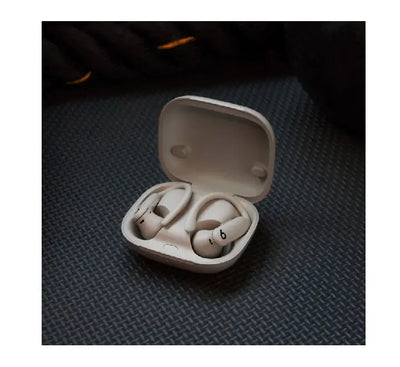 Beats Powerbeats Pro 2 wireless earbuds in Quicksand color with earhooks