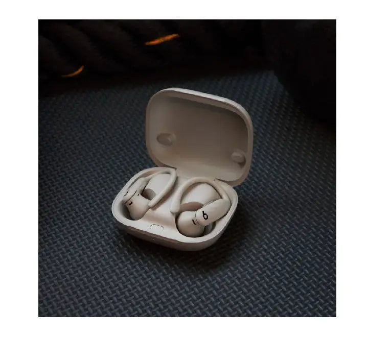 Beats Powerbeats Pro 2 wireless earbuds in Quicksand color with earhooks