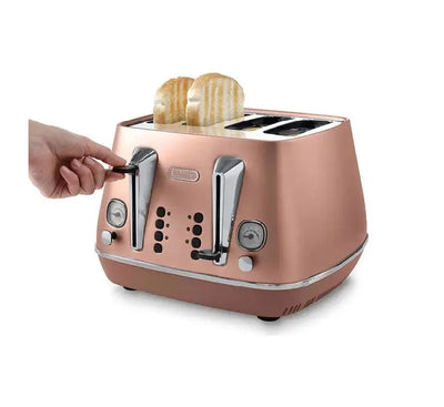 Close-up view of the dual independent electronic control panels on the copper De'Longhi toaster, showing browning dials and neon indicator buttons.