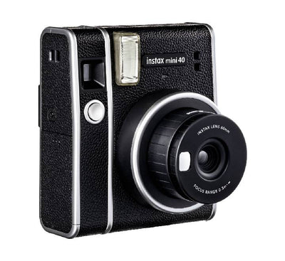 Side view of instax mini 40 camera ejecting a credit card-sized instant photo print.
