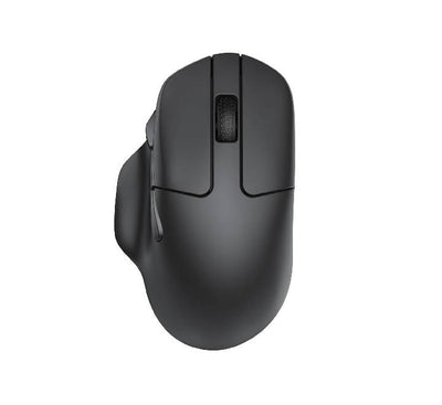 Keychron M7 wireless mouse in black shown from an ergonomic angle view, highlighting its comfortable contoured shape.
