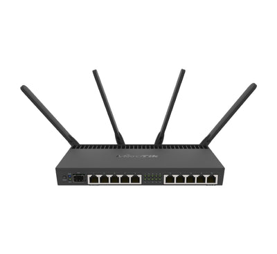 MikroTik RB4011iGS+5HacQ2HnD-IN desktop router front view showing metal enclosure and ports
