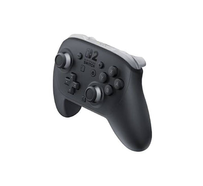 Gamer holding the Nintendo Switch 2 Pro Controller while playing a console game in a comfortable gaming chair setup.