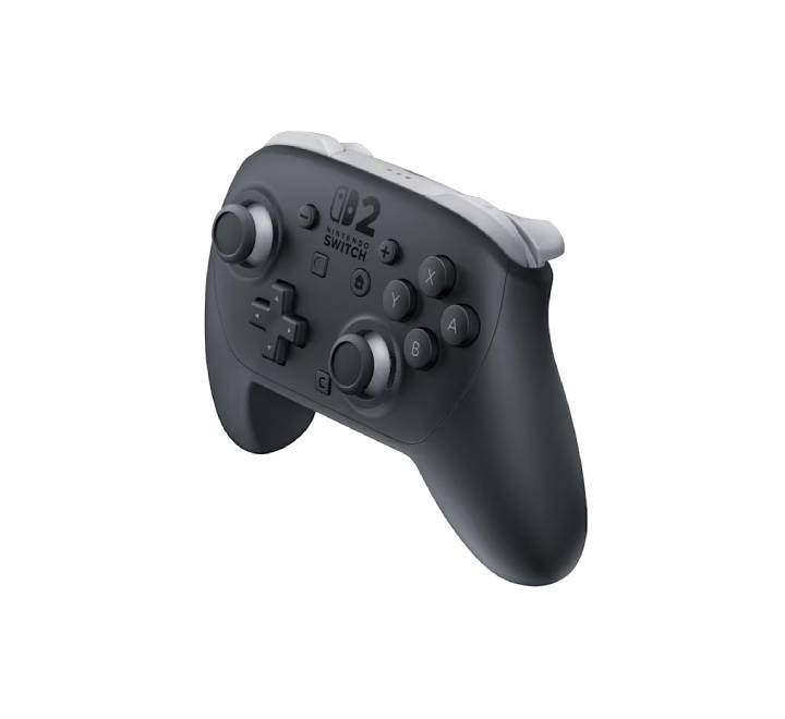 Gamer holding the Nintendo Switch 2 Pro Controller while playing a console game in a comfortable gaming chair setup.