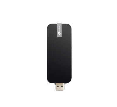 TP-Link Archer T4U wireless USB adapter plugged into a laptop using its included desktop extension cable.