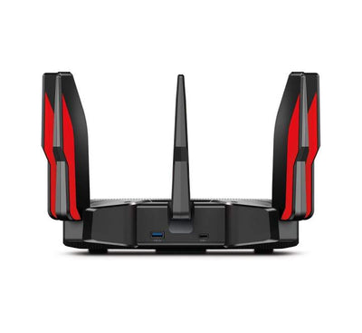 TP-Link Archer AX11000 router installed in a professional gaming setup, highlighting ultra-low latency and WiFi 6 performance for competitive gaming.