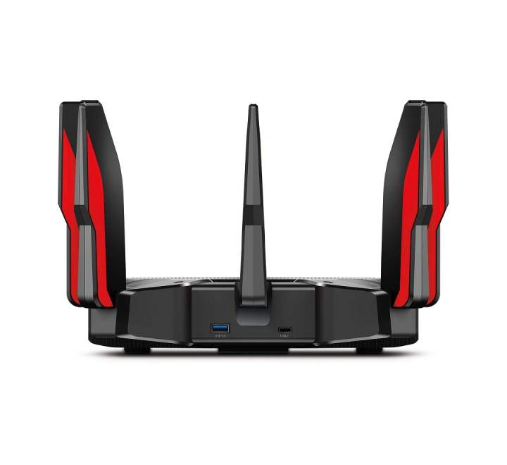 TP-Link Archer AX11000 router installed in a professional gaming setup, highlighting ultra-low latency and WiFi 6 performance for competitive gaming.