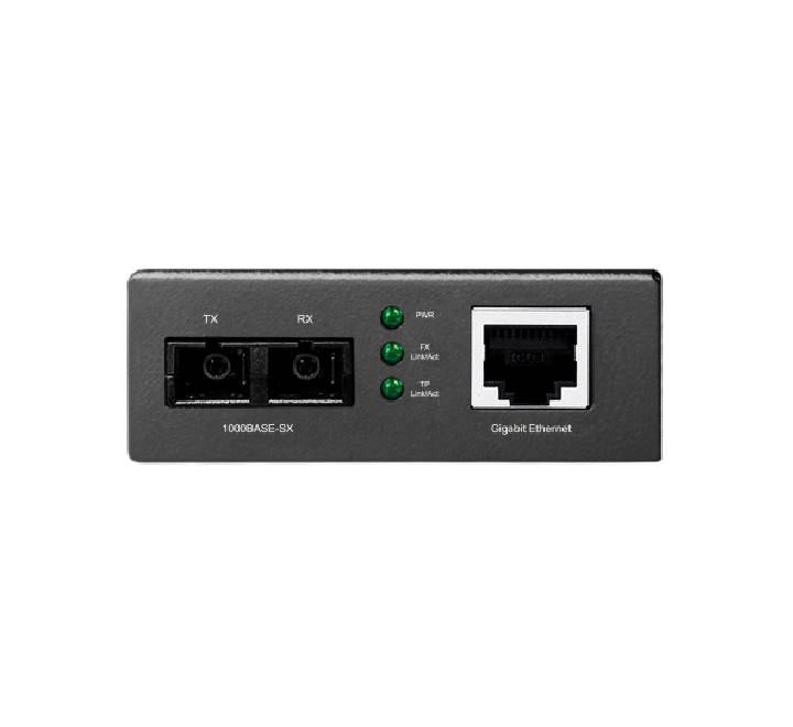 Official retail packaging box and documentation for the TP-Link MC200CM Gigabit Multi-Mode Media Converter.