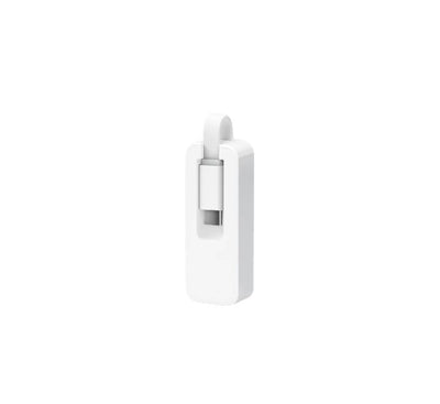 Close-up of the TP-Link UE300C ethernet adapter with its type-c cable folded away securely inside the integrated protective storage groove.