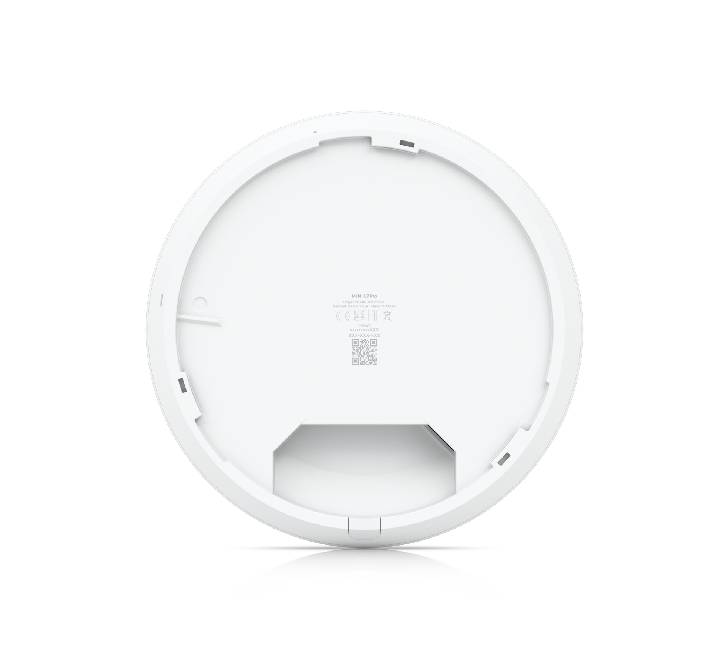 An installed white Ubiquiti UniFi U7 Pro enterprise access point flush-mounted cleanly onto a modern office drop ceiling.