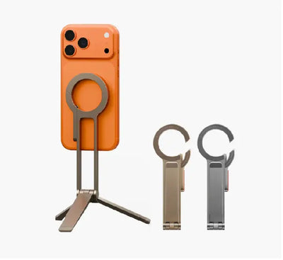 UNIQ Arcus magnetic tripod stand in TriArc stability mode holding an iPhone on a flat surface.