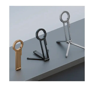 UNIQ Arcus aluminium magnetic phone tripod folded and clipped to a backpack using the built-in carabiner.