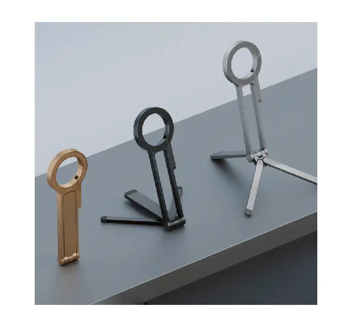 UNIQ Arcus aluminium magnetic phone tripod folded and clipped to a backpack using the built-in carabiner.