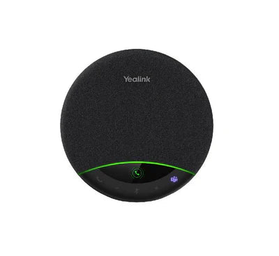 Yealink MSpeaker II mounted on a wall below a conference room display.